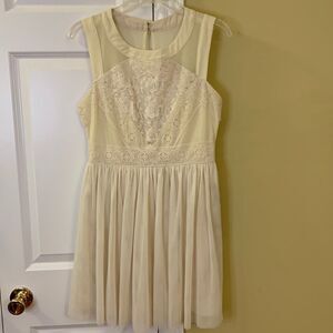 GB Size Medium formal mini cream color dress.  Lined with two layers of toile